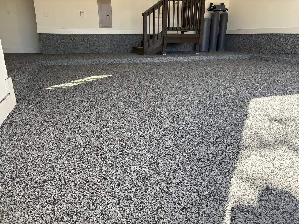 Garage Hero flooring contractor installing epoxy garage flooring
